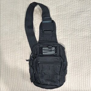 Small tactical sling bag new without tags.